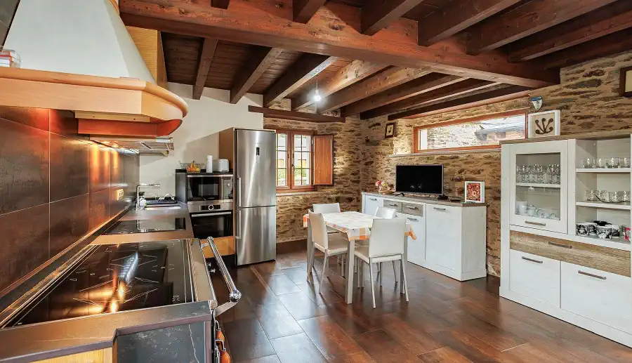 Galicia: Renovated kitchen inside a traditional stone house